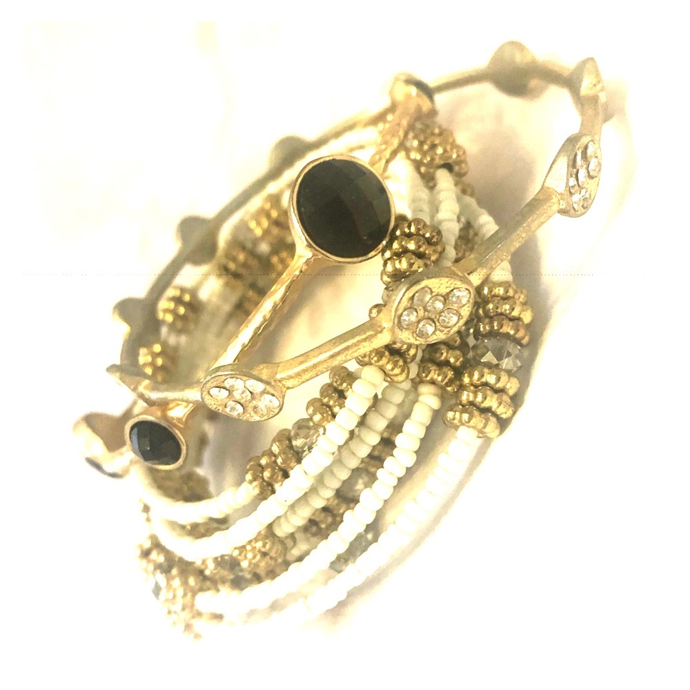 Bundle of three bracelets gold/white/black